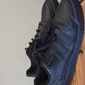 Adidas Forum Low in a black or "Core Black" colorway. Size 12